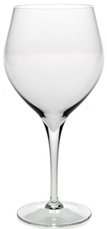 A clear, empty wine glass with a wide bowl, fine rim, and thin stem stands upright against a white background—an elegant piece from the Lillian Drinkware Collection by William Yeoward Crystal.