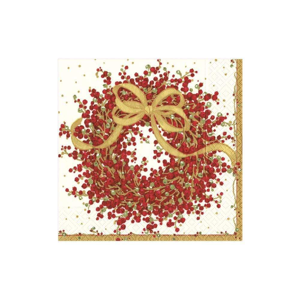 The Pepperberry Napkin Collection by Caspari features decorative red berries, green leaves, and a gold ribbon bow on a white background with a gold border. Triple-ply, printed in Germany with nontoxic inks.