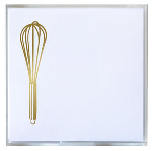 A gold foil whisk illustration appears in the upper left of Black Ink's Whisk Small Paddie notepad, featuring 160 crisp white square sheets.