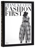 The "Fashion First" book by Rizzoli features a black and white photo of a woman in plaid coat, hat, and checked suit on the cover, channeling iconic Annie Hall style with the title displayed in bold lettering.