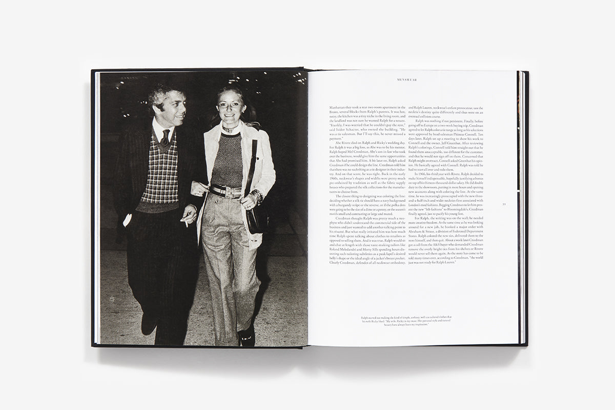 Open to a black-and-white photo of a man and woman walking on the left and text on the right, "Ralph Lauren: In His Own Fashion" by Abrams is ideal for fans of men’s fashion or Ralph Lauren’s biography.