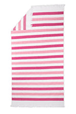 The Matouk Amado Beach Towel features horizontal pink and white stripes plus white fringe on the short edges—a stylish rectangular towel ideal for the pool or beach.