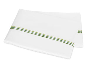 A folded white bedsheet from the Matouk Amara Triple Pearl Bedding Collection in Palm Green, featuring a double-row decorative green stitch near the edge.