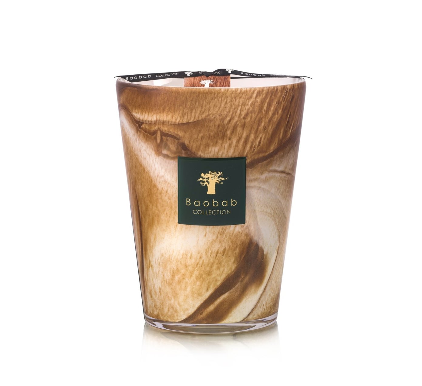 The Baobab Collection Atlas Tichka Candle in a brown and white marbled glass with a black "Baobab" label releases a scent of vetiver and Atlas cedar.
