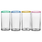 Four ribbed drinking glasses from Juliska's Nell Drinkware Collection, crafted with mouth-blown glass, feature colored rims in green, blue, yellow, and pink—displayed side by side on a white background.