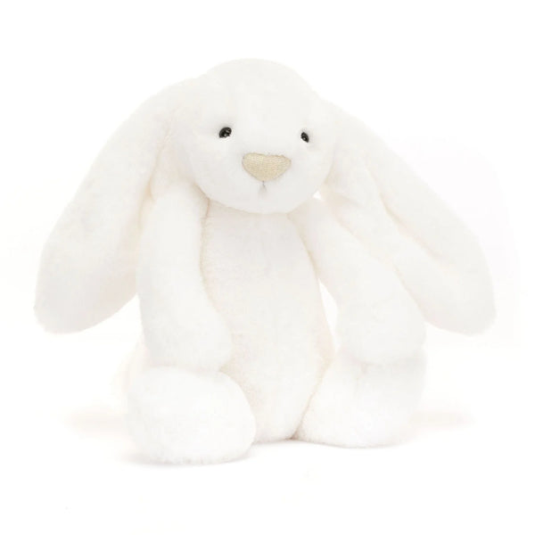 Bashful Luxe Bunny Luna, a white stuffed bunny designed by Jellycat, sitting on a white background.