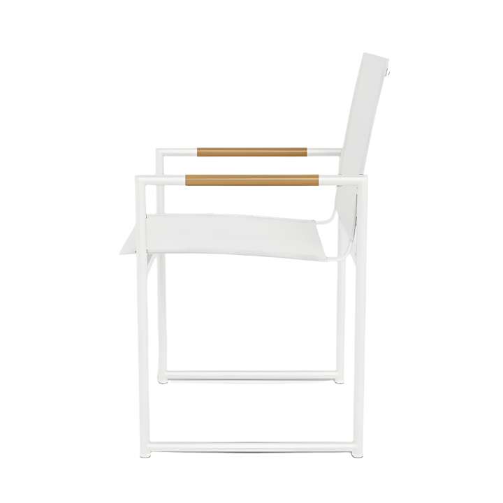 Side view of the Breeze Dining Chair in White Panama Blanco by HARBOUR OUTDOOR, a modern aluminum outdoor chair with an all-weather sling seat, straight lines, and wooden armrest accents.