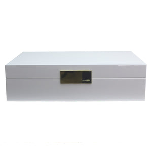 The Addison Ross Lacquer Jewelry Box is rectangular, white, with a polished glossy finish and a gold-colored rectangular clasp on the front.