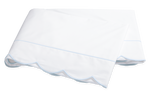 Two folded white bedsheets from the Matouk Butterfield Bedding Collection, Blue, feature elegant scallop detailing and blue-edged trim, crafted from luxurious Egyptian cotton percale.