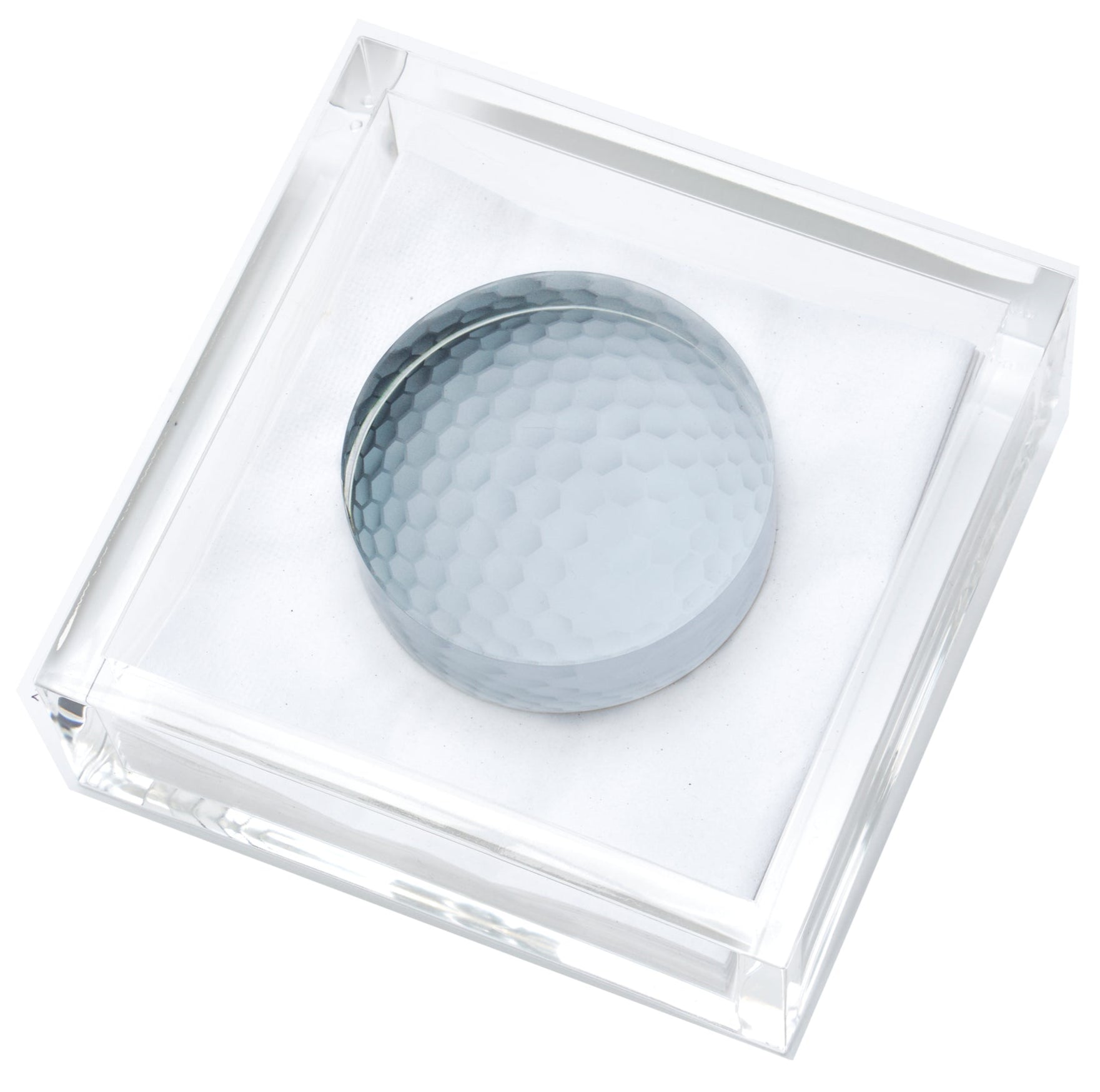 The Lucite Cocktail Napkin Holder with Golf Ball Weight by Tara Wilson Designs features a round, textured glass golf ball in a clear, square acrylic case—an elegant accessory and functional napkin holder for any gathering.