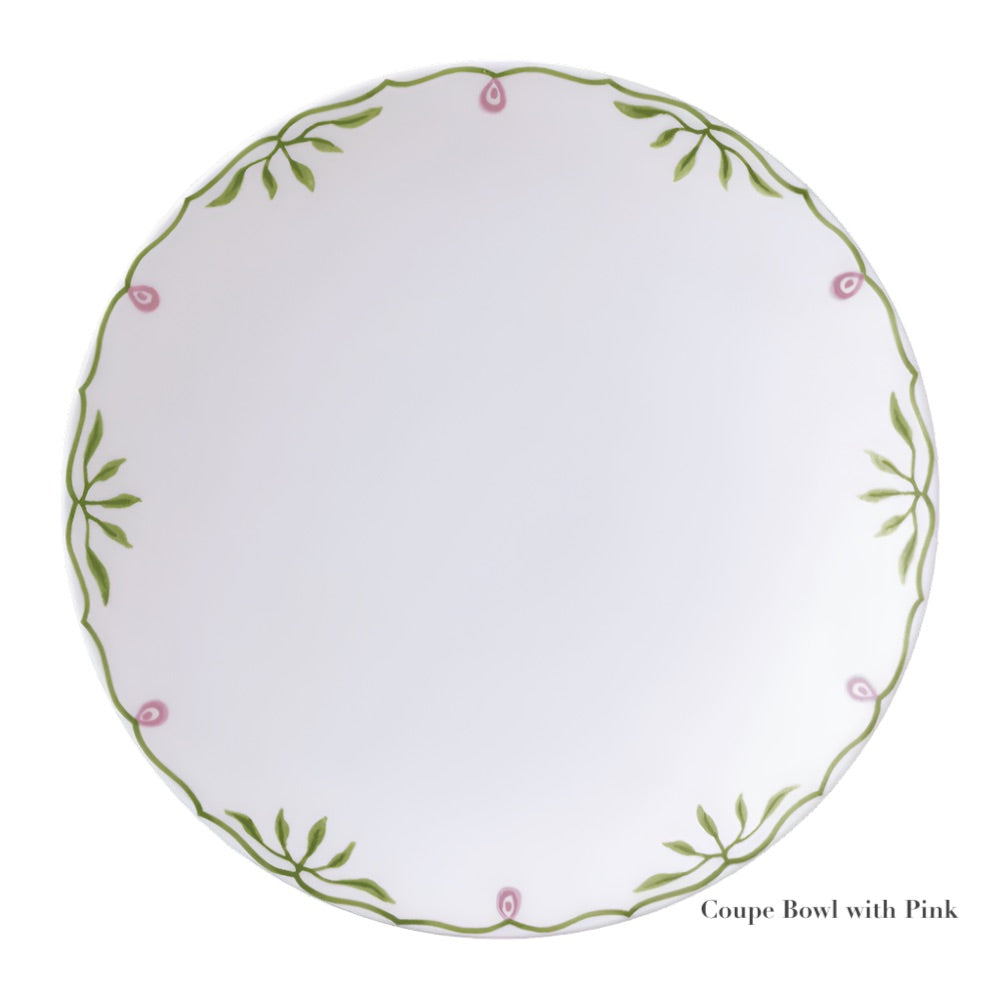 A round white coupe bowl from the Cobblers Cove Camelot Dinnerware Collection by Royal Crown Derby, crafted in fine bone china with green leaf and pink accents. "Coupe Bowl with Pink" appears in the bottom right corner.