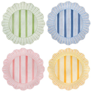 The Juliska Cabana Stripe Melamine Dinnerware Collection features four round shatterproof plates with scalloped edges and vertical stripes in green, blue, pink, and yellow, arranged in a 2x2 grid on a white background.
