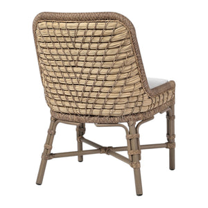 The Capitola Outdoor Side Chair in Nit Witty Sea Salt by PALECEK features a woven synthetic seagrass backrest and seat with four sturdy powder-coated aluminum legs, shown from behind.