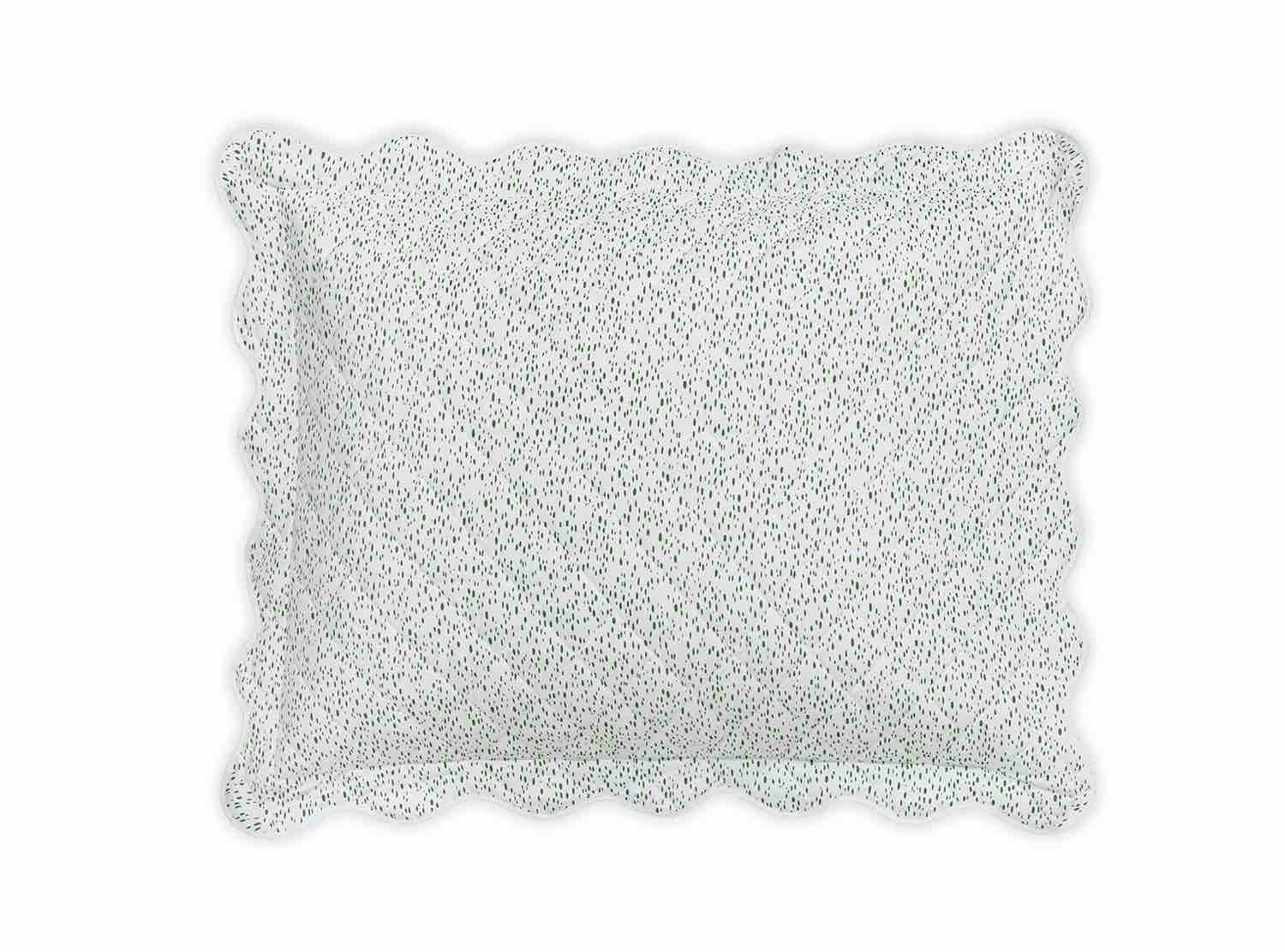 The Celine Bedding Collection, Grass by Matouk features a rectangular pillow with small green dots on white Egyptian cotton percale, embroidered scalloped edge, and OEKO-TEX Standard 100 certification.