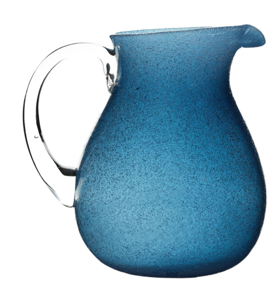 A Memento Acrylic Pitcher Collection in blue frosted glass with unique colors and a clear handle, isolated on a white background.