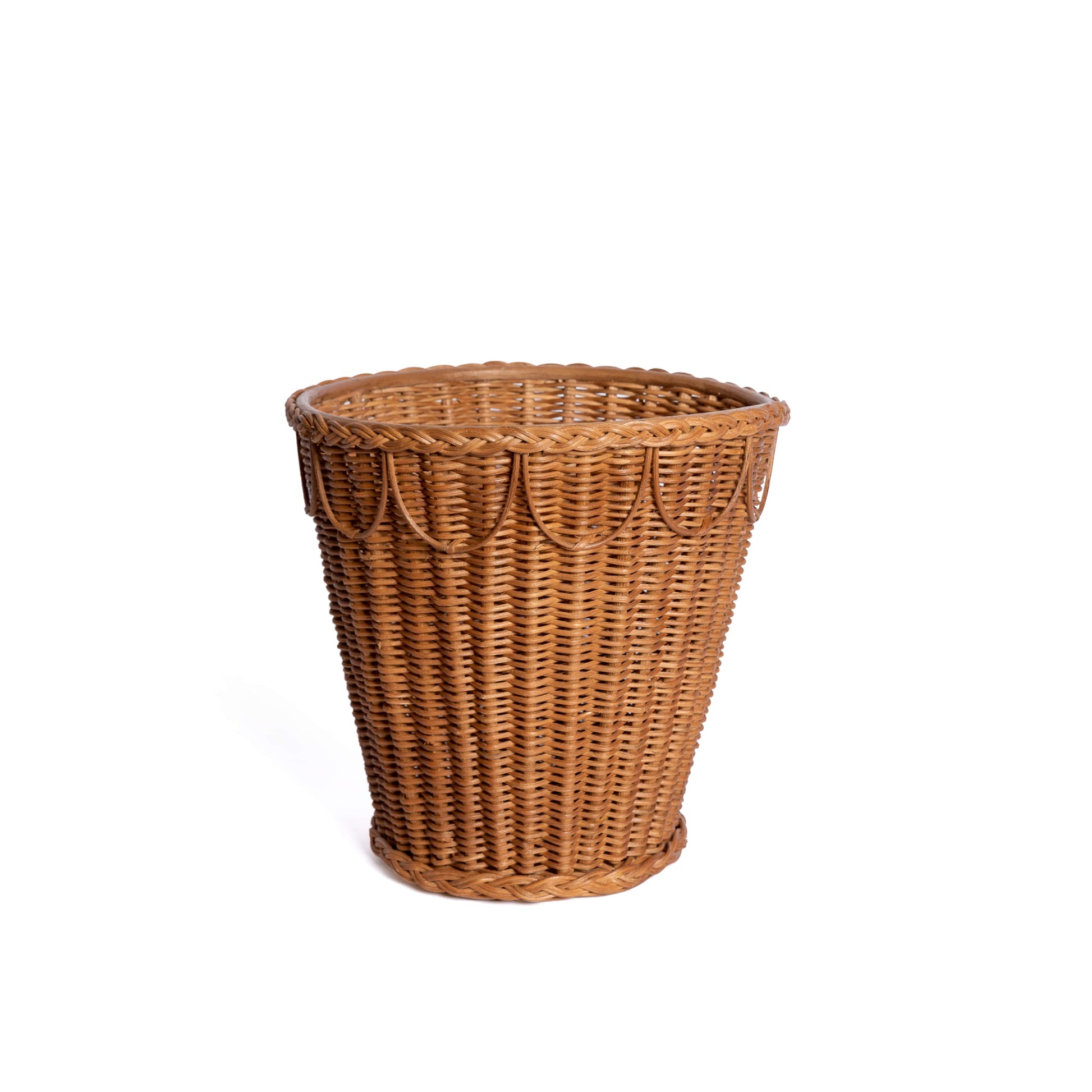 The Pinet Plant Pot Collection by Sharland England features tall, cylindrical wicker baskets with decorative woven patterns, ideal as natural rattan plant pots or stylish houseplant holders. Photographed against a white background.