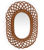 The Sharland England Oval Mirror features a decorative woven rattan frame with an intricate looping pattern, adding French antique charm against a crisp white background.