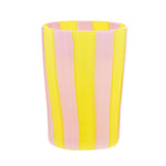 The Aquazzura Casa Murano Dolcevita Stripe Tumbler Collection features handblown tumblers with alternating vertical pink and yellow stripes on a white background.