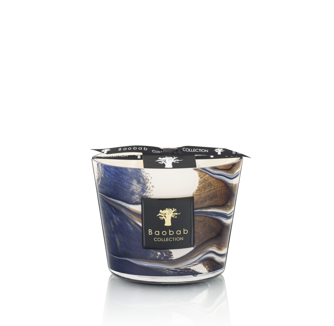A Baobab Delta Nil scented candle in a hand-blown glass container with marbled blue and white patterns against a black background.