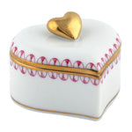 The Herend Double Heart Box, Raspberry by Herend features a heart shape, gold trim and handle, and hand-painted red designs—perfect for artistic appreciation.