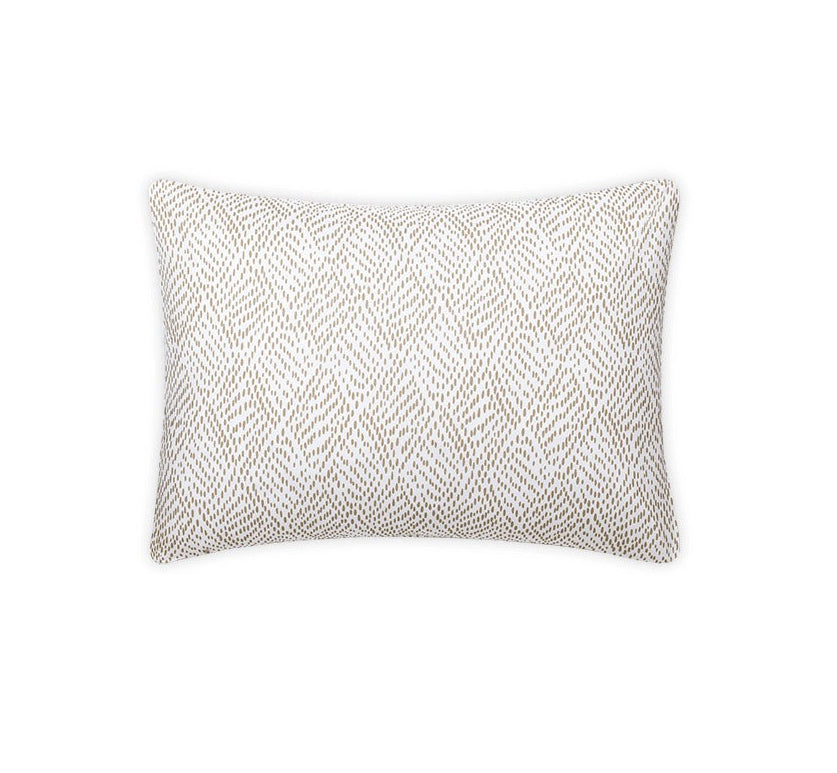The Matouk Duma Diamond Bedding Collection, Dune, features a rectangular decorative pillow with a white background and subtle light brown harlequin pattern, crafted from OEKO-TEX® certified Egyptian cotton percale.