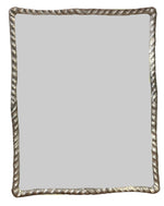 The Ebb & Flow Mirror in Silver by Carvers' Guild features a rectangular design with a twisted silver frame, offering sophisticated simplicity with its plain reflective surface.