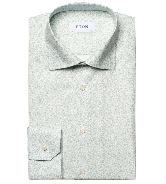 A flat-laid light green Eton Micro Floral Poplin shirt, featuring a pointed collar and buttoned cuffs.