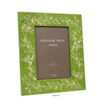 The Addison Ross Chinoiserie Frame Collection features a green frame with a blossom design and high-gloss lacquer for elegance. It has an interior label, "Addison Ross London," and measures 5'' x 7''.