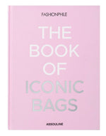 Fashionphile: The Book of Iconic Bags" is a pink hardcover by Assouline celebrating luxury accessories and iconic investment handbags.