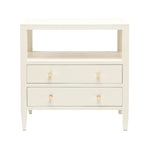 The Jarin Nightstand Collection by Made Goods features a white wooden linen nightstand with two drawers on European glides, an open shelf above, and four tapered legs—a testament to quality craftsmanship in every detail.