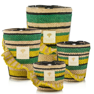 Four Baobab Collection "Fety Milalao" woven baskets in different sizes with green, black, and yellow stripes and a hint of vetiver.