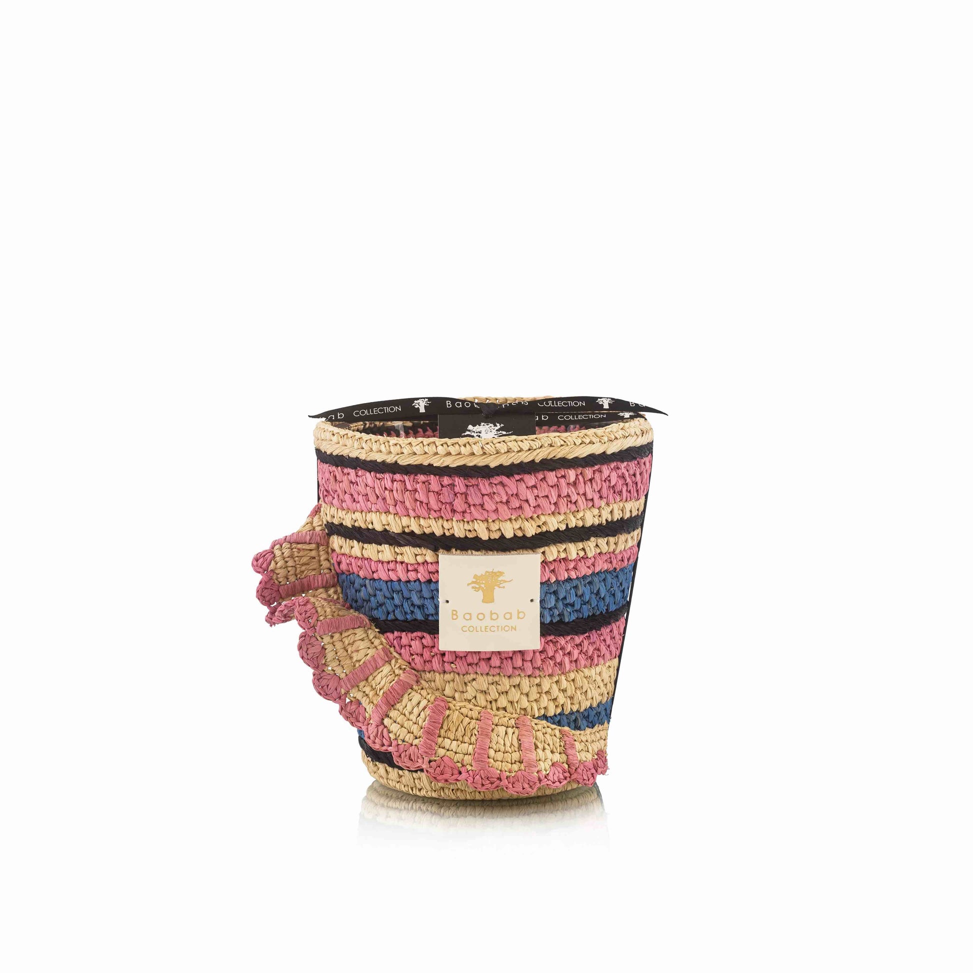 The Baobab Collection Fety Mandihy Candle, a multi-colored striped candle holder with a decorative ruffled edge, creates a charming raffia candle ensemble.