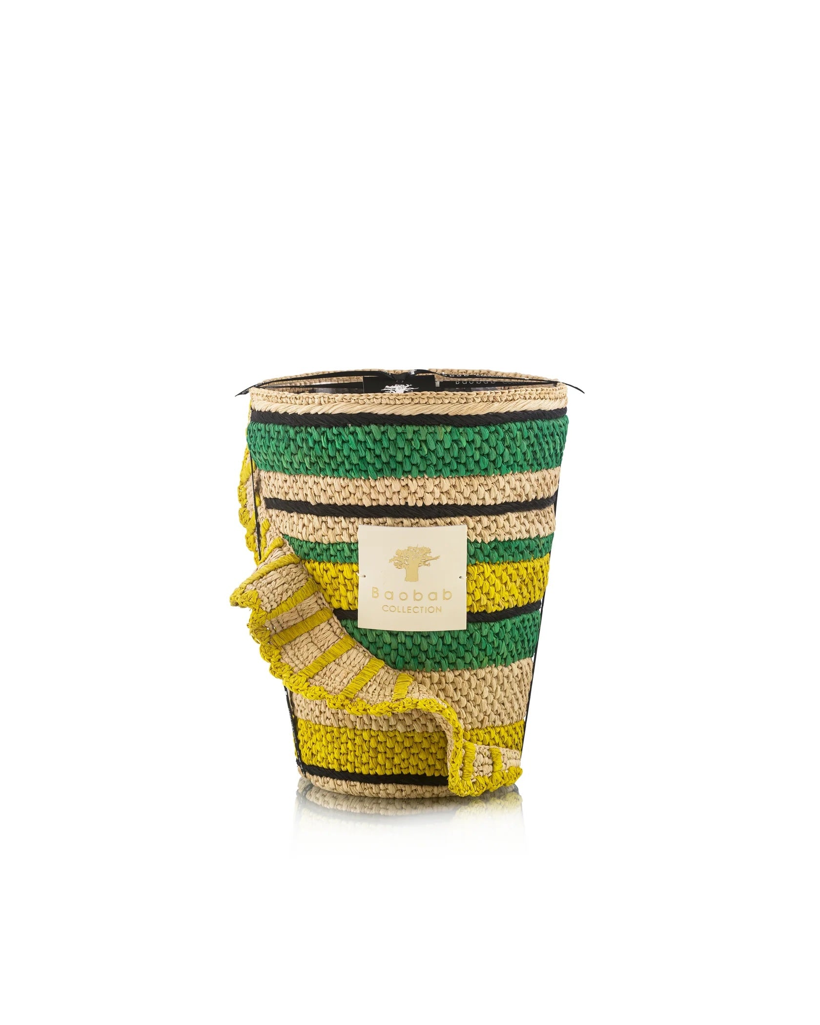 The Baobab Collection Fety Milalao Candle by Baobab is a woven decorative candle holder with green, yellow, and beige stripes plus a yellow ruffle design and front label, infused with calming ylang-ylang notes to bring tranquility to any space.