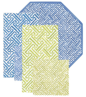 Caspari’s Fretwork Collection showcases four geometric mats in blue, green, and beige tones—three rectangular or square and one octagonal—designed for durability and everyday elegance.