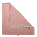 The Washed Fringe Napkin Set by Deborah Rhodes features a pink rectangular linen/cotton napkin with frayed edges, folded to display both sides. "Pink" is labeled below, ideal as a no-iron choice for casual dinnerware settings.