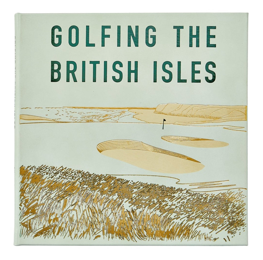 Cover of "Golfing the British Isles" by Graphic Image, featuring elegant gold outlines of a top seaside golf course.