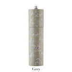 The Addison Ross Chinoiserie Salt and Pepper Mill Collection features a tall cylindrical rubber wood mill with a white floral and small bird design, durable ceramic grinding mechanism, and “Grey” label at the base.