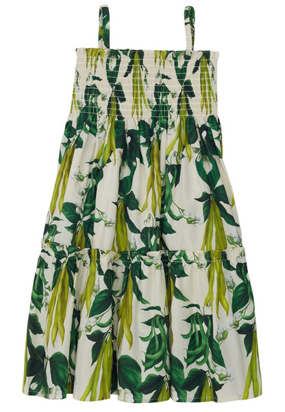 Cara Cara sleeveless summer dress with a green and white tropical leaf print, featuring ruffled tiers and smocked top.