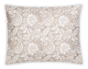 The Granada Bedding Collection, Dune by Matouk features a rectangular pillow with a beige and white floral pattern on a black background, crafted from soft cotton percale and inspired by traditional block print textiles.