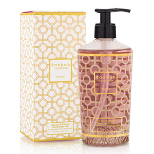 A Baobab Collection Women Body Wellness hand wash gel with a pump dispenser and feminine scent, shown beside its matching patterned box from the Baobab brand.