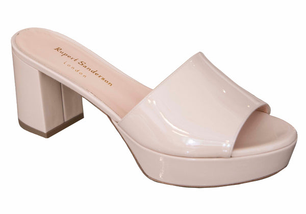 A single pale pink mid platform slide sandal with a 75mm block heel, handmade in Italy.