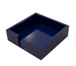The Black Ink Blue Lacquer Small Notepad Holder features a dark blue, square design with raised edges and an open front—perfect for notes or coasters and makes an elegant desk tray or thoughtful office gift.