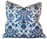 Handmade in the USA, the Damour Blues Pillow by Hive Custom Pillows features a square shape, white background, and an intricate blue pattern of birds, flowers, and leaves arranged symmetrically.
