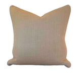 The Cobble Farthing Pillow by Associated Design is a handmade beige square decorative pillow with a simple texture, crafted in the USA and set against a white background.
