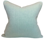 The Oscar Celadon pillow by Hive Custom Pillows is a square, light blue cushion with a smooth fabric texture, crafted from premium materials and displayed against a white background.