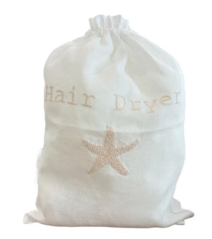 The Haute Home Hair Dryer Bag, Cream Starfish, features "Hair Dryer" labeling and an embroidered starfish on the front—ideal for travel storage and adding seaside charm.
