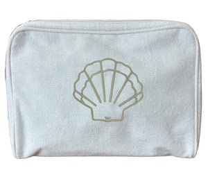 The Weezie Towels Large Shell Toiletry Bag in Sand is a rectangular, light gray bag with a gold seashell outline on the front, ideal for easy organization and versatile use.