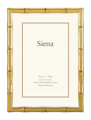 The Siena Bamboo Silverplate Frame Collection by Tizo Design features a minimalist bamboo silhouette in silverplate with a cream insert displaying "Siena"—ideal for displaying treasured memories and frame details below.