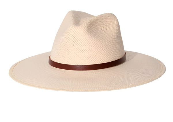 A light beige Janessa Leone Judith Hat with a regenerative leather strap isolated on a white background.