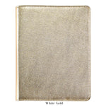 The Graphic Image 9" Leather Notebook features a closed, metallic white gold leather cover with a textured finish and refillable pages, shown against a white background.